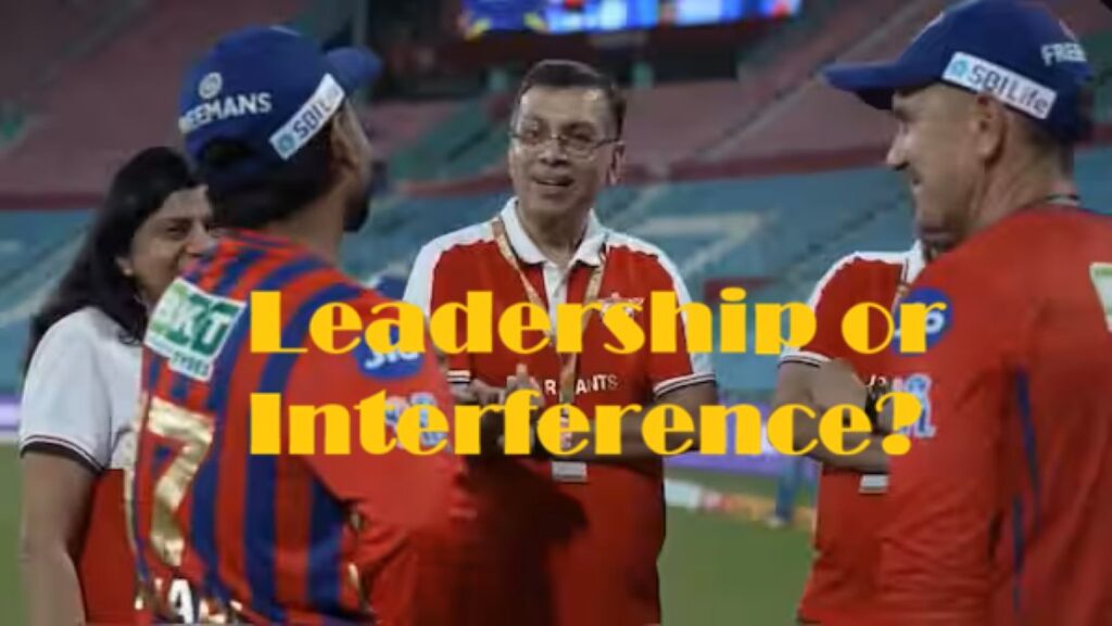 Sanjiv Goenka watching Lucknow Super Giants during an IPL match while players discuss tactics on the field